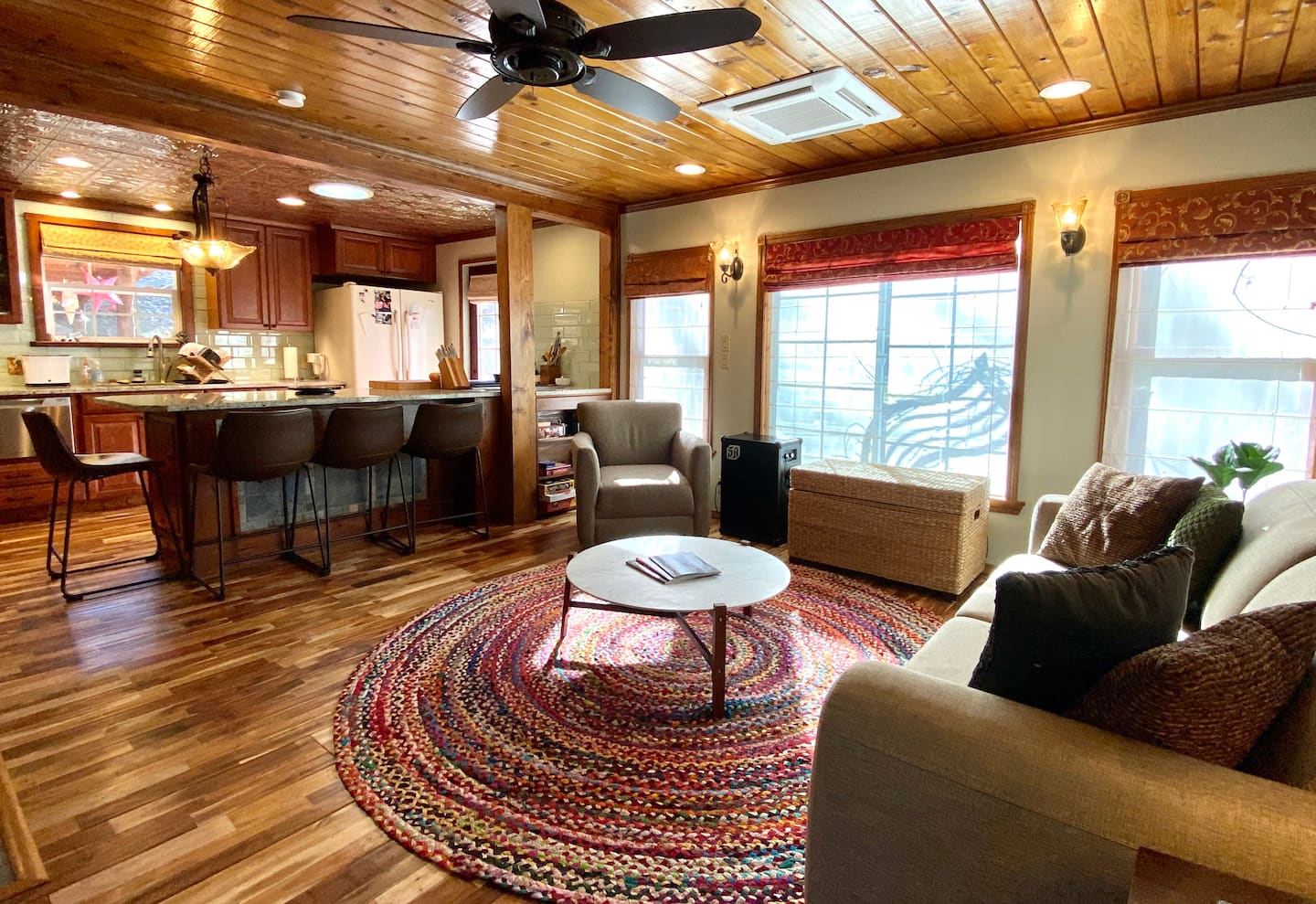 When you walk in the front door, you'll enter an open floor plan room, where the living room and kitchen share a warm, beautiful space