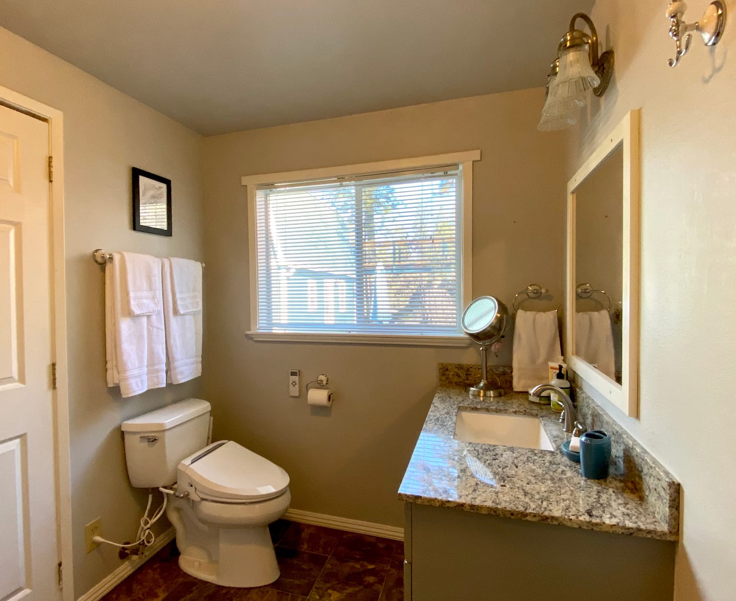The bathroom also features a heated toilet seat and bidet